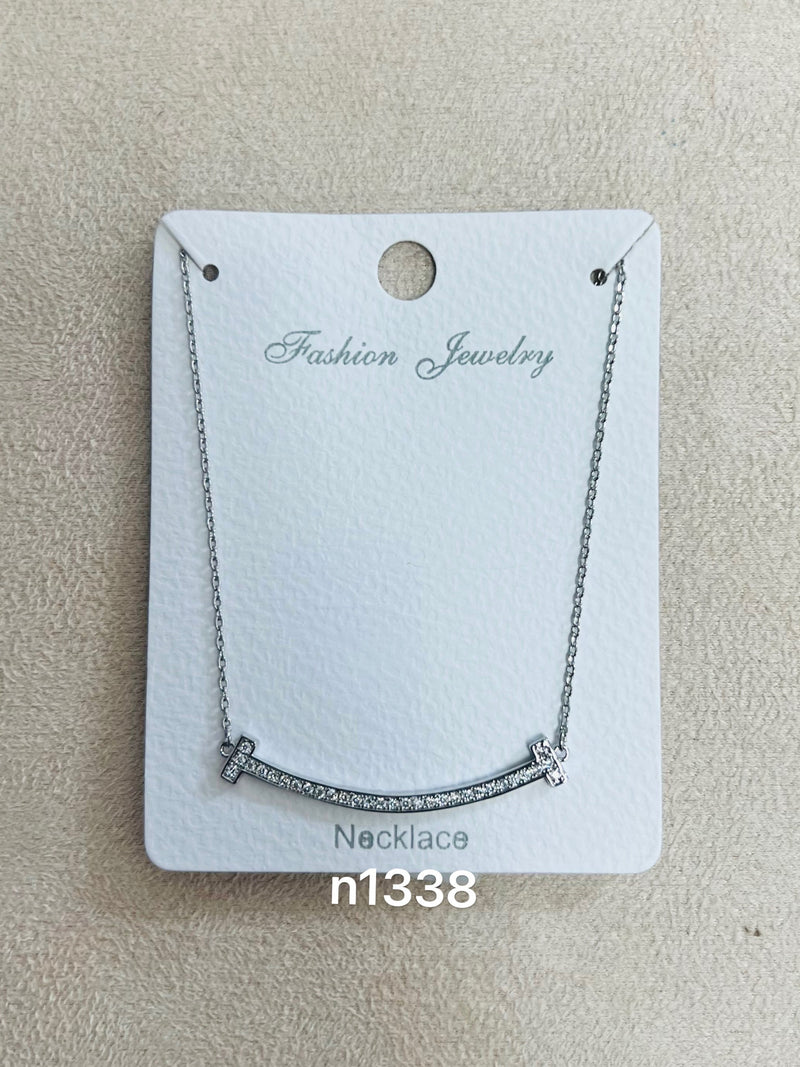 Curved Bar Pendant C.Z Rhodium Plated Pendant Necklace