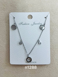 Multi-Charm with Mother of Pearl C.Z Rhodium Plated Necklace