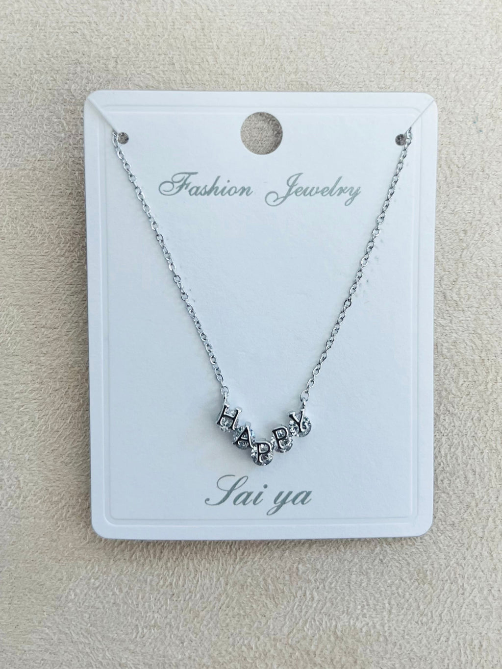 "HAPPY" C.Z Rhodium Plated Pendant Necklace