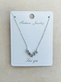 "HAPPY" C.Z Rhodium Plated Pendant Necklace