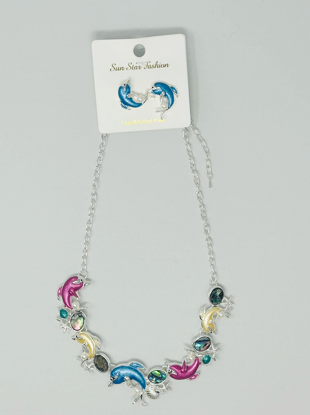 "dolphin and shell" earring and necklace set