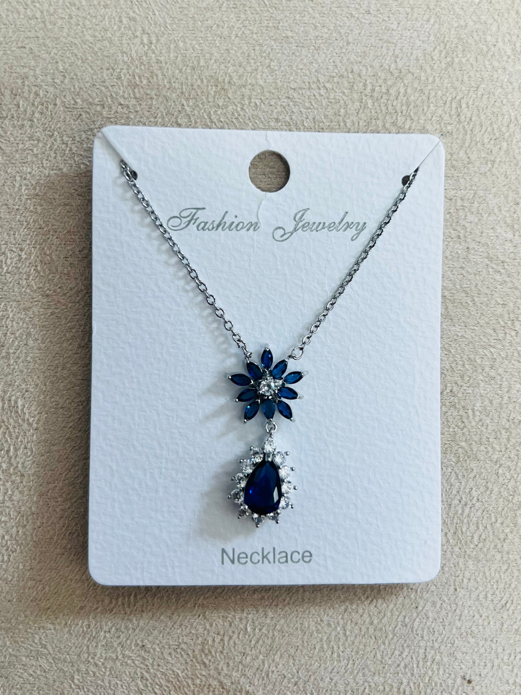 Silver Starburst Drop Pendant C.Z Rhodium Plated Necklace