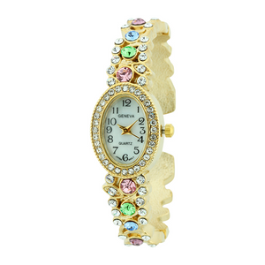 OVAL FACE FANCY CUFF WATCH WITH STONES AROUND