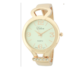 Round Face Arabic & Stick Cuff Watch.