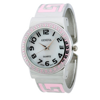 ROUND FACE CUFF WATCH WITH DIAGONAL PATTERN