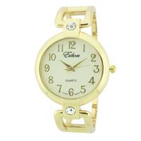 Round Face Arabic Cuff Watch.